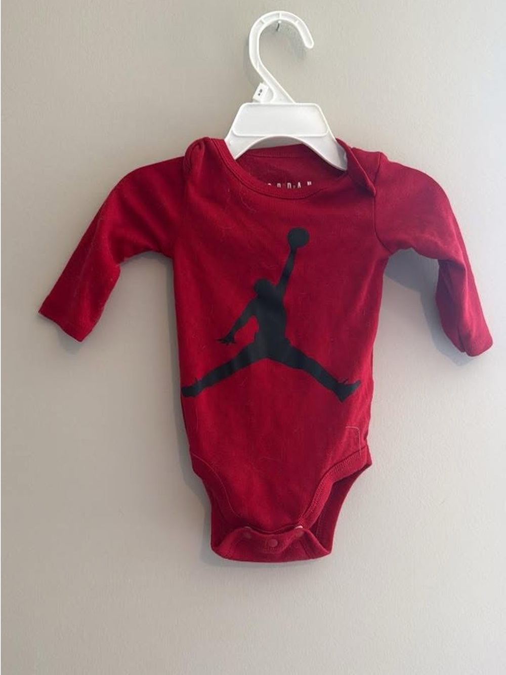 Jordan Red Long-Sleeve Baby Bodysuit with Black Jumpman